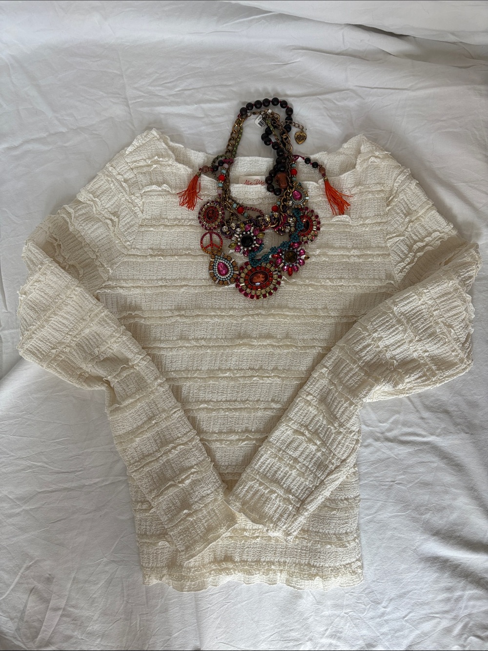Cream ruffled blouse